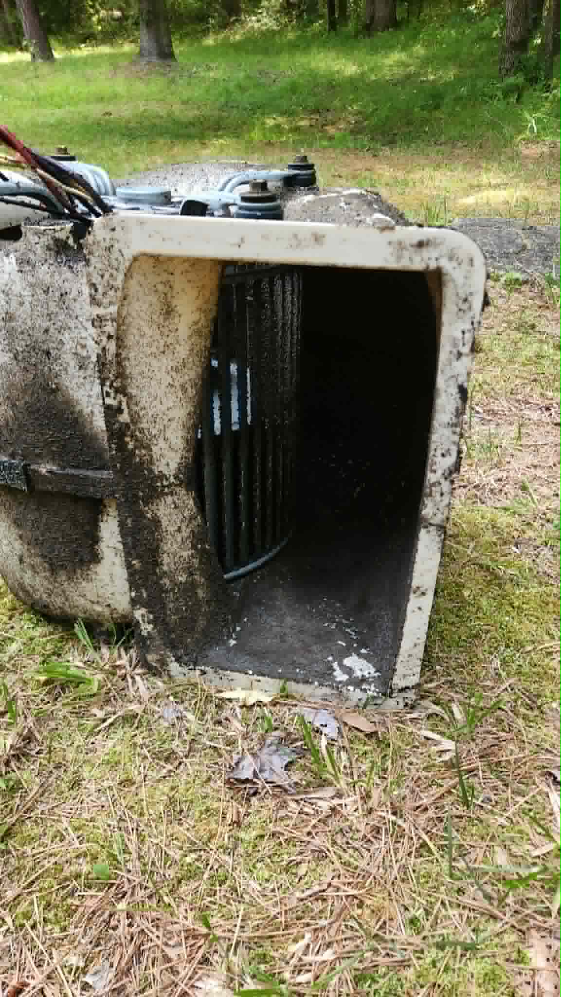 Blower assembly caked in dirt before service